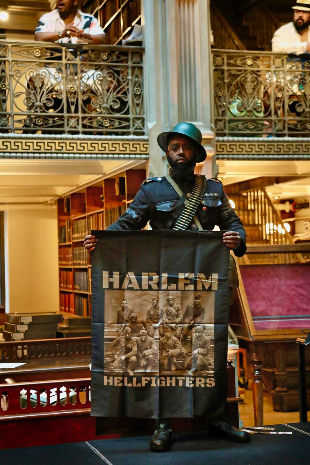 A performer on the stage at the George Peabody Library